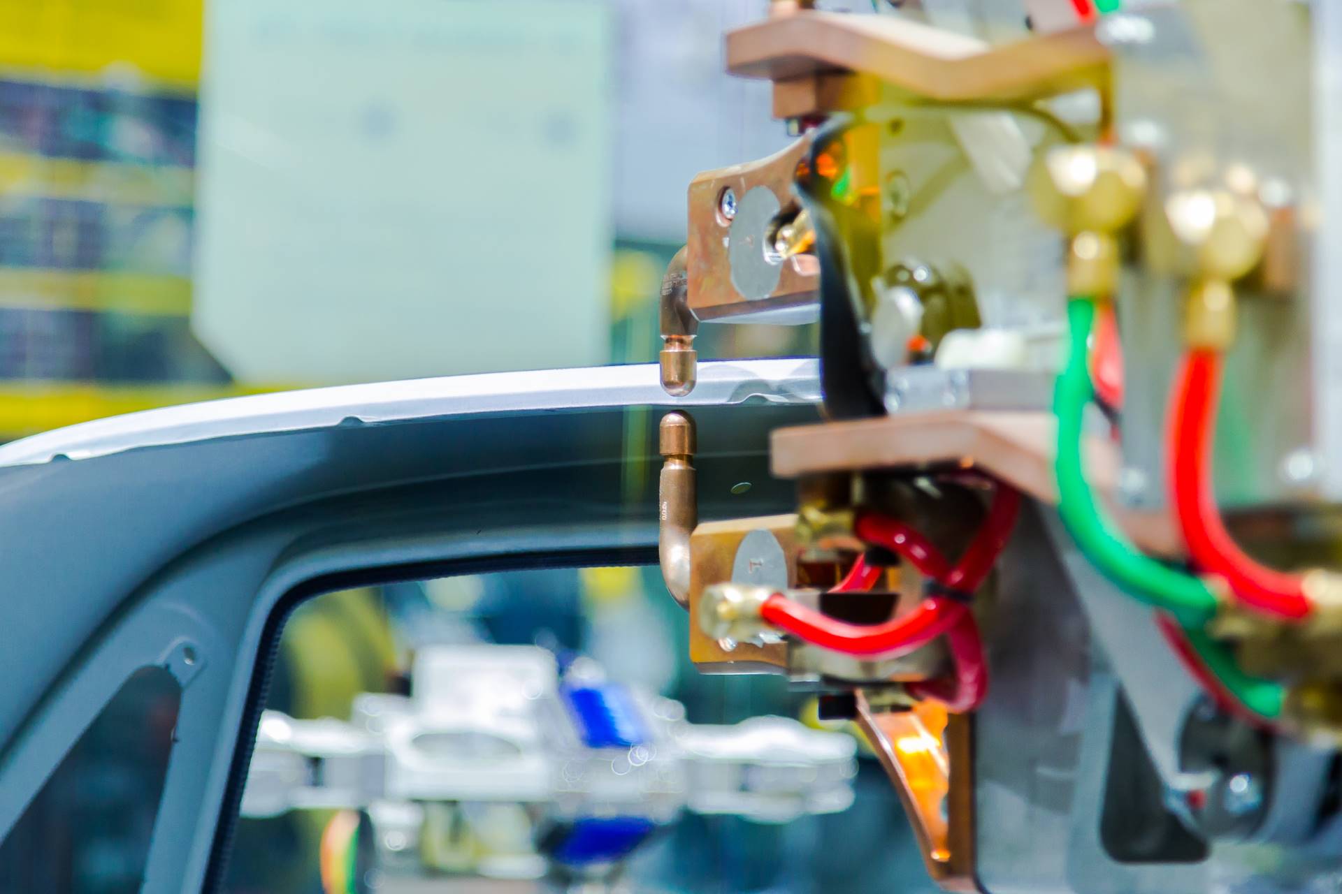 industrial-welding-robots-for-automotive-assembly-2021-08-29-21-04-55-utc (Custom) Michigan Omron automotive machine vision systems